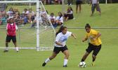 Samoana’s Deidra Steffany defends against a Tafuna Warrior opponent during an ASHSAA varsity girls’ soccer game on Saturday, Feb. 24, 2018 at Pago Park Soccer Stadium.  [FFAS MEDIA/Brian Vitolio]