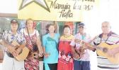 Director of Territorial Administration of Aging Evelyn Lili’o-Satele with Hula Fitness instructor Vatau Galeai and the band, which plays for the Hula fitness class. The hula class is from Monday to Thursday, at 7:30am to 8:30am. [photo: Ese Malala]