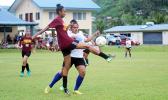 A Tafuna Warriors’ player clears the ball away from a Samoana opponent during the championship game of the ASHSAA Girls’ J-V division on Wednesday, March 14, 2018 at Pago Park Soccer Stadium.  [FFAS MEDIA/Brian Vitolio]