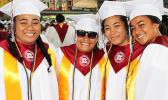 Some of the fellow graduates who continue to smile despite feeling sad at leaving this chapter in their life — high school at the Warrior Nation.  [photo: EM]
