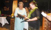 First lady Cynthia Malala Moliga (left) during the gift and award presentation to the 2017 Territorial Teacher of the Year, Dana Love-Ili, at the TTOY celebration sponsored by the Dept. of Education at the Tradewinds Hotel Pavilion last Friday evening.  [photo: FS]