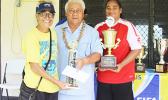 Tafuna Jets’ club president Naomi Oney, left, and the women’s team captain and league MVP Beulah Oney, right, receive their awards from FFAS President Faiivae Iuli Alex Godinet during the awards ceremony for the 2016 FFAS National League that ended on November 26, 2016 at Pago Park Soccer Stadium.  [FFAS MEDIA/Brian Vitolio]
