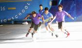 A Taputimu Youth player in action against two PanSa opponents during the 13th Place Tier competition of the 2017 FFAS Futsal Tournament on Monday, May 29 at the Samoana High School gymnasium in Utulei.  [FFAS MEDIA/Brian Vitolio] 
