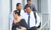 Deputy Attorney General Mitzie Jessop-Ta’ase (front) with the three senior police officials from Tonga coming out of the District Court building following a hearing yesterday morning for US citizen, Dean Fletcher, who is wanted in Tonga for the alleged murder of his wife. The officials are here to escort Fletcher back to Tonga to stand trial, however the District Court has not accepted the plea agreement between the fugitive and the government.  [Photo: AF]