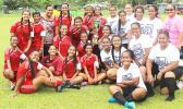 The Vaiala Tongan and Ilaoa & To’omata women’s teams are pictured with the women’s FFAS National Cup after their game on Saturday, Sept. 23, 2017 at Pago Park Soccer Stadium. Vaiala Tongan took the cup away from Ilaoa & To’omata following a 6-0 win. See story in today’s Sports section. [FFAS MEDIA/Brian Vitolio]
