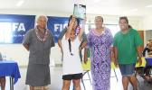 A Mt. Alava elementary student raises her school’s Just Play Program Most Improved Award during the ASDOE/FFAS Just Play Program finale on Thursday, April 27, 2017 at the DYWA gymnasium in Pago Pago.   [FFAS MEDIA/Brian Vitolio]