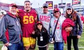 Trojans #60 Viane Talamaivao with his grandparents Tasi and Imeleta Asuega and uncle Johnny Nansen, Assistant Coach for the USC Trojans.  [Courtesy photo]