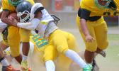 Jefferey Tago – Mike Linebacker for the Wildcats laying a solid hit on Leone’s ball carrier in the second half of their JV action last Saturday morning. Leone suffered a six-point loss against the Nu’uuli Wildcats 36 - 30. [photo: TG]