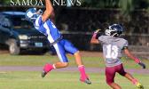The opening touchdown of the Samoana and Tafuna Junior Varsity match up last Friday evening – a long pass out the Jurgen Krusen that was caught in the end zone for six early in the opening quarter of the JV game. Unfortunately, they lost against the Warriors 24 - 22. [photo: TG]