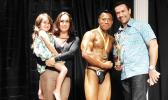 New Champion Aunese Tauinailoa of Aua and his sponsor Aaron Forsgren & family after winning the Sau Ia Bodybuilding Competition of 2017 held last Friday at the Gov. H. Rex Lee Auditorium in Utulei. [Photo: EM]