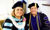 ASCC President Dr. Rosevonne Makaiwi-Pato congratulates Senouefa Talaina Leota-Gogo Mana’o