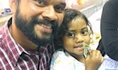 Three-year old Abigail Gaunavou and her father