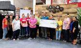 Pictured is the staff of Neil’s ACE Home Center, ASCCC members, cancer patients and their family members. 