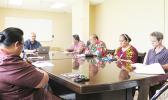 Department of Agriculture Acting Director Tapa‘au Dr. Daniel Mageo Aga discusses collaborative food safety efforts with staff from the American Samoa Community College — Agriculture, Community and Natural Resources Division, the American Samoa Department of Agriculture and the American Samoa Environmental Protection Agency during a meeting at the DOA facility.  [Photo: D. Helsham]