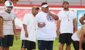 All-Star Head Football Coach, Kevin Magalei speaking with his offensive coordinator, Sua’ese Pooch Ta’ase