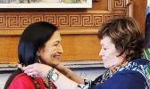Congresswoman Uifa’atali Amata presents an ula fala to her former House colleague, new Secretary of the Interior Deb Haaland