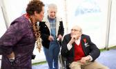 Amata speaks with WWII veteran in London