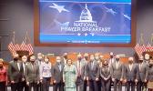 Amata and other Representatives and Senators at the National Prayer Breakfast.