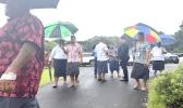 Junior Ami approached by police officers