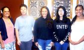 ASCC President Dr. Rosevonne Makaiwi Pato congratulates this semester's recipients of the College's in-house scholarships. (l-r) Dr. Pato, Jin Lin Du, Louaivasa Laulu, Jingling Jiang, and Rianna Lafaele.  [Photo: J. Kneubuhl]
