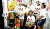 Members of the American Samoa Community College student club X-Factorials visit the LBJ Hospital Pediatric Ward to share some Christmas cheer