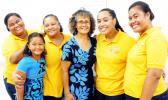 ASCC Business Department chairperson Dr. Faofua Faatoafe (center) celebrates with four of her students (and one of their daughters) upon their return from a field trip to the Independent State of Samoa, where they observed the operating methods of a number of businesses.  