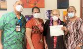 Mrs. Diana Tarrant (2nd right) (left to right) ACNR Director Aufa’i Apulu Ropeti Areta, Acting Vice President of Administration and Finance Ms. Grace Tulafono, and ASCC President Dr. Rosevonne Pato