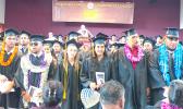  Some of the 132 graduates of the American Samoa Community College’s Spring 2018 Commencement  Ceremony held last Friday morning when Commencement speaker, Lt. Gov. Lemanu Sialega Palepoi Mauga (on stage) called on them to turn towards their parents, family members and others in the audience - to thank them for their support. [photo: Leua Aiono Frost]