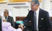 Local Department of Homeland Security director Samana Semo Ve’ave’a shaking hands with senators following a Senate committee hearing