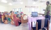 Pulenuu watching presentation