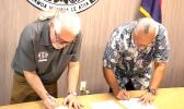 Dr. Neil Woolf and Gov. Pula