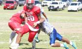 Advent Migi of the Vikings carrying this one for huge yardage for the Big Red Machine during the second quarter of their playoff game against the Sharks. photo: TG]