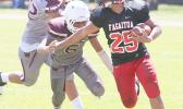 Faga'itua's Jesse Toilolo powering his way through midfield and carrying this one for the Vikings deep inside Tafuna’s territory in the final quarter of their JV game last Saturday. The Vikings lost 14-24 against Tafuna.  [photo: TG]