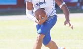  Samoana's Paul Fano storming towards the end zone with the fumble to score his first touchdown during the first half of a JV game against the Lions. Fano led the Sharks to a crushing 34-6 victory. [photo: TG]
