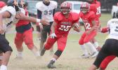 Faga’itua Vikings running back, Jesse Toilolo dancing through midfield and reading his defenders as he carries the rock for the Vikings in the second half of their Junior Varsity game against the Wildcats last Friday evening. Toilolo helped the Vikings to a 8-0 victory.  [photo: TG]