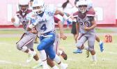Kobe Lefiti storming through midfield to take this one to the end zone for a 50-yard touchdown reception – a pass from Tanielu at midfield connected with Lefiti’s slant route to the middle that scored Samoana’s second touchdown of the game in JV competition. [photo: TG]