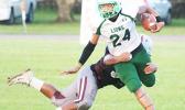 Joshua Taani of Leone returning an interception in the second quarter of their junior varsity match up against the Warriors last Thursday evening. Taani helped the Lions ito a 16-6 victory over Tafuna.  [photo: TG]