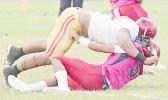 Faga’itua Vikings Ina Ta’ase is stopped immediately in the back by big Francis Mauigoa