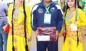 American Samoa Wrestler Zena Iese with two Turkmenistan Dancers after welcoming ceremony. (Photo:ASNOC\TCA) American Samoa Wrestler Zena Iese with two Turkmenistan Dancers after welcoming ceremony. (Photo:ASNOC\TCA)
