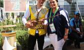 Terry Custodio Auva’a, Team American Samoa’s Press Attache for the 2017 - 5th Asian Indoor and Martial Arts Games, takes time out for a photograph with a Turkmenistan dancer and dutar player during the First Official Team Welcoming Ceremony . (Photo:ASNOC\TCA) Terry Custodio Auva’a, Team American Samoa’s Press Attache for the 2017 - 5th Asian Indoor and Martial Arts Games, takes time out for a photograph with a Turkmenistan dancer and dutar player during the First Official Team Welcoming Ceremony . (Photo:ASNOC\TCA)