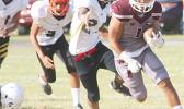 Tafuna’s ‘Samurai’ Koison Ozu, returning this kick off all the way to the end zone to score his first touchdown of the game – a 91 yard touchdown return in the first half of a JV game against the Wildcats last Friday evening.  [photo: TG]