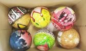 Six of the 26 ornaments painted by Leone HS art students this