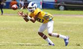 The AYFS Rams defensive back, Fano – about to pick off his first interception of the game against the AYFS Packers - during the season opener last Saturday at the Veterans Memorial Stadium. [photo: TG]