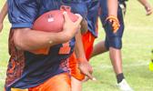 Vaifanua Peko-Vai of the Bears at the sidelines, and storming towards the end zone. He was brought down shy of the goal line, but carried this one for a huge gain for the Bears in their win against the Steelers to secure them a spot in the championship game this Saturday. Peko-Vai helped the Bears in a  20-6 victory over the Steelers. [photo: TG]