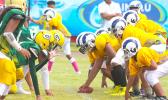 The Rams offensive unit readying to snap the ball against the Packers defense during the second half of their semi-final match last Saturday. The Ram defeated the Packers 22-14. [photo: TG]