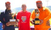 AYFS Bears Head Coach Sa Suluai with his Offensive Coordinator Keith Leuta receiving the AYFS Perpetual Trophy for the third time, along with the 1st Place trophy for being ‘Back-2-Back’ Undefeated Champs during the awards ceremony last Saturday. Also pictured is AYFS President Victor Avalos. [photo: TG]