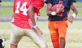 Marcus Samia storming through midfield with the ball, carrying this one for huge yardage for the Bears. Samia helped the Bears to a 38-12 victory over the Niners. [photo: TG]