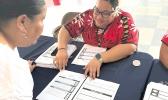 election offficial explaining the ballot