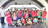 Pictured are some of the kids who came out on Saturday, with Coach Michael Pereira (standing far left)  [photo: Mark Espiritu]