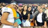 Belford Viali poses with family following